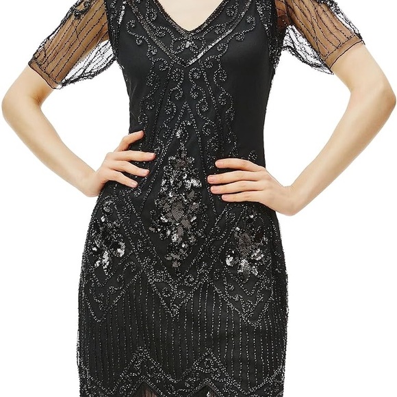 Dresses & Skirts - NWOT Ladies roaring 20’s era dress in black. Black sequins and fringe. Size XL